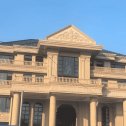 平顶山黄金麻别墅外墙干挂石材效果示例