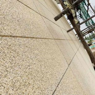 平顶山 黄金麻花岗岩荔枝面外墙干挂石材效果示例