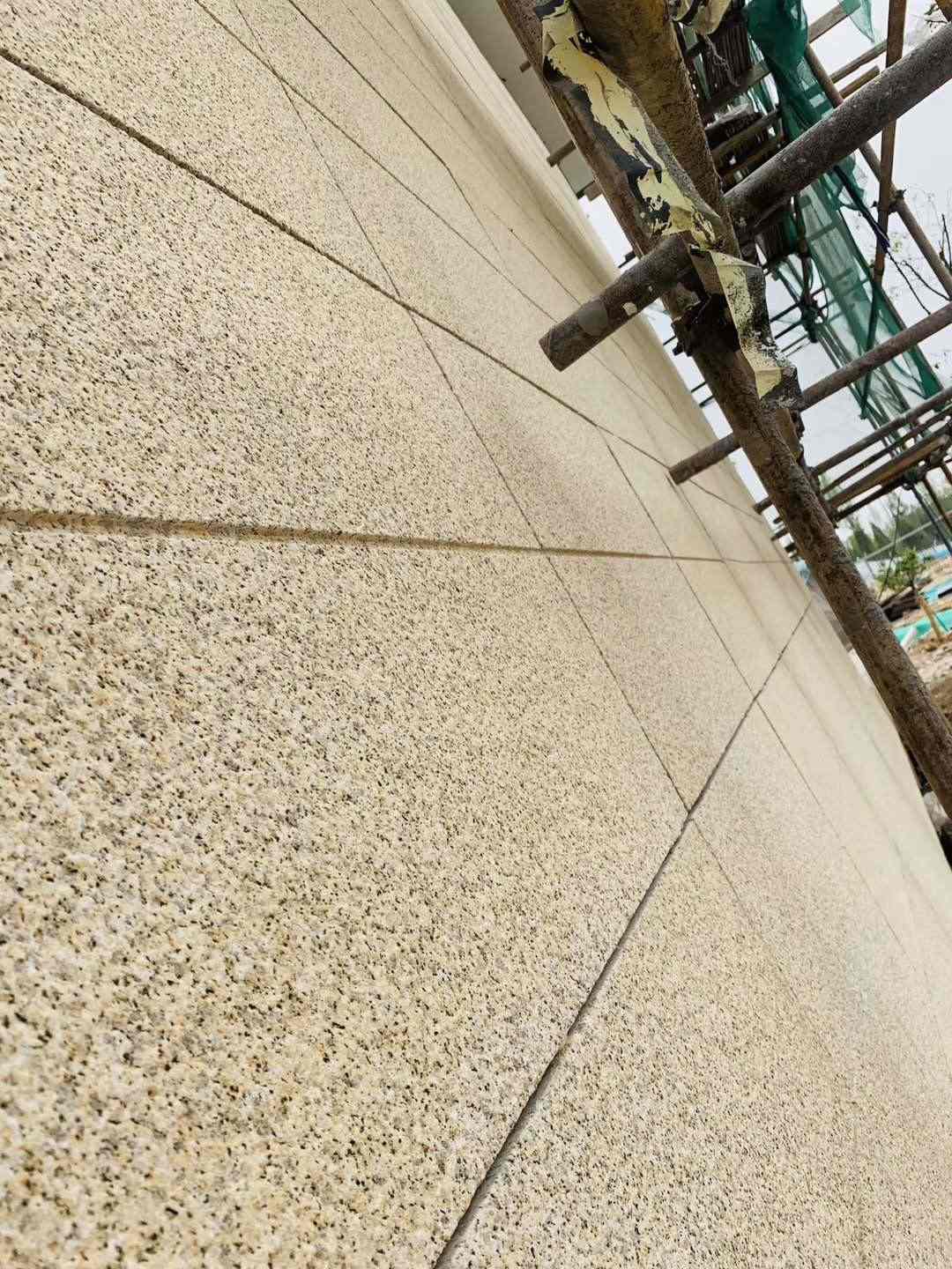 平顶山 黄金麻花岗岩荔枝面外墙干挂石材效果示例